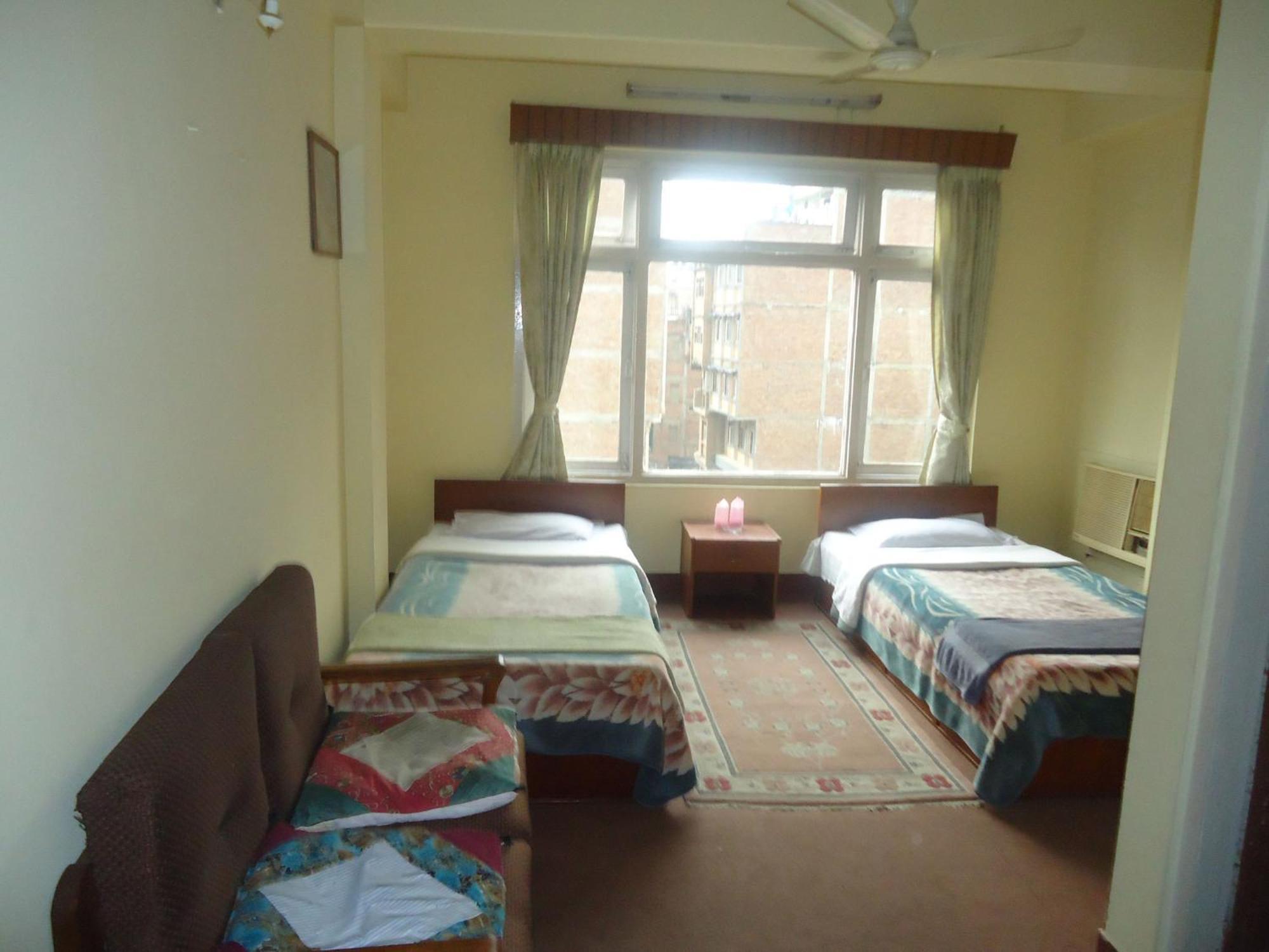 Hotel Discovery Inn Katmandu Oda fotoğraf