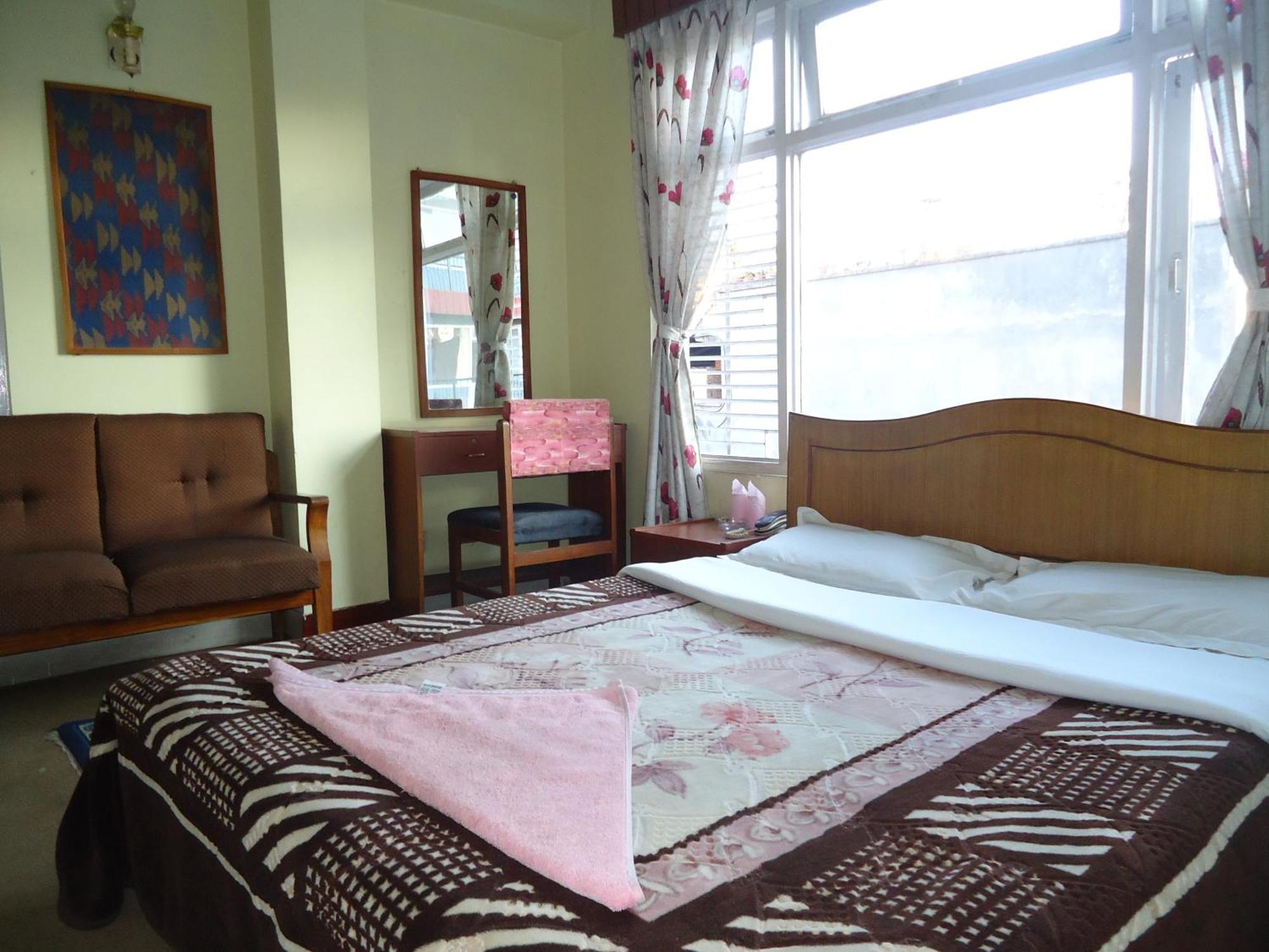 Hotel Discovery Inn Katmandu Oda fotoğraf