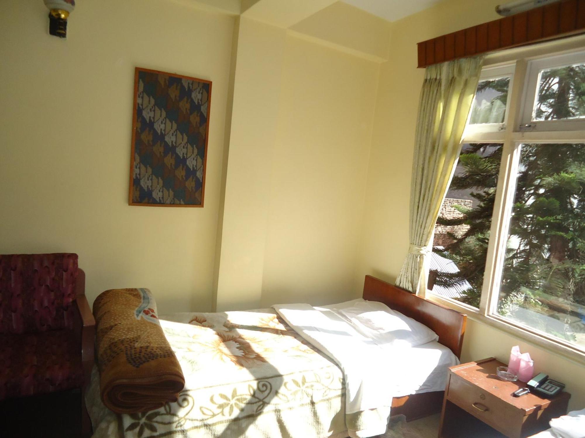 Hotel Discovery Inn Katmandu Oda fotoğraf